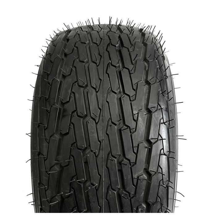 215/60-8 18 1/2" x 8 1/2" x 8" 8-ply LRD 990 lbs Roadguider tire and 8" 5-hole white rim with valve